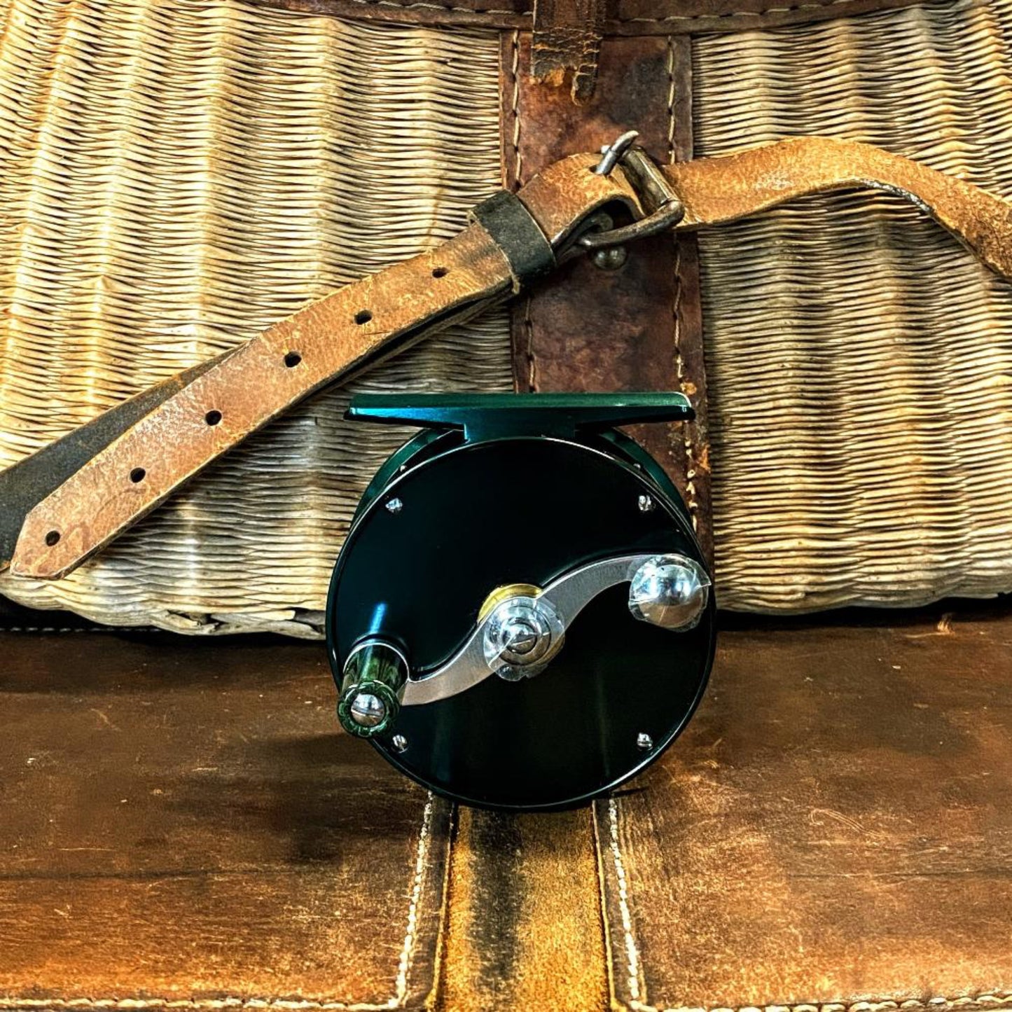 Nikko Leaf Small Trout reel showing green spool and classic S-handle design